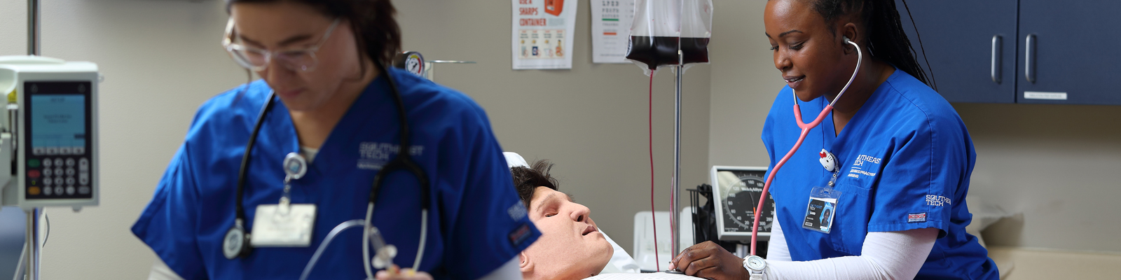 Nursing student in hospital room with stethoscope