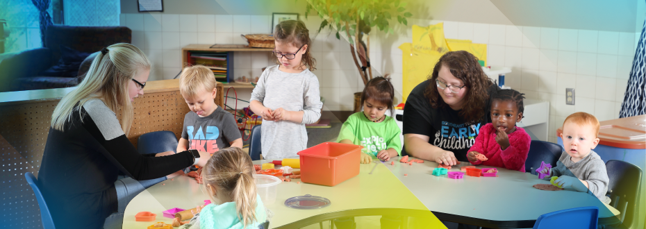 Group of students working in early childhood classroom and lab