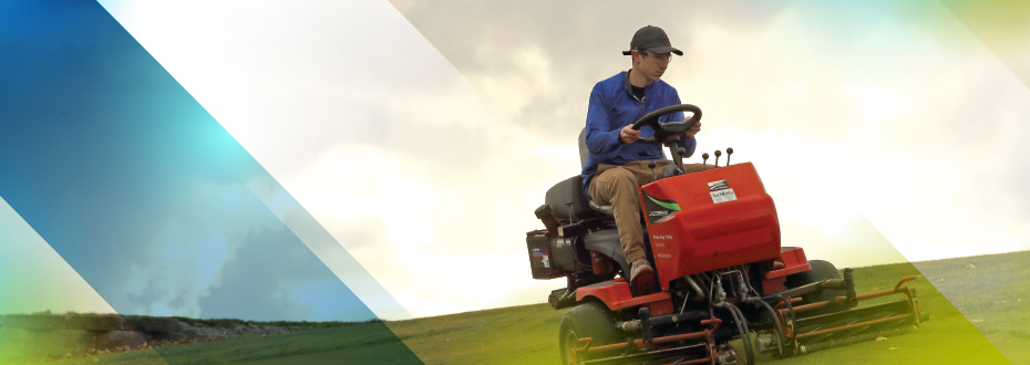 Two Southeast Tech students in a classroom, collaborating in front of a desktop computer
