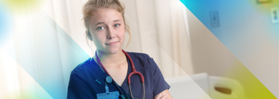 Male student in hospital room checking blood pressure on young female