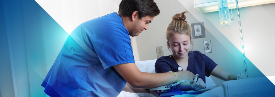 Cardiovascular Technologist looking at screen in exam room